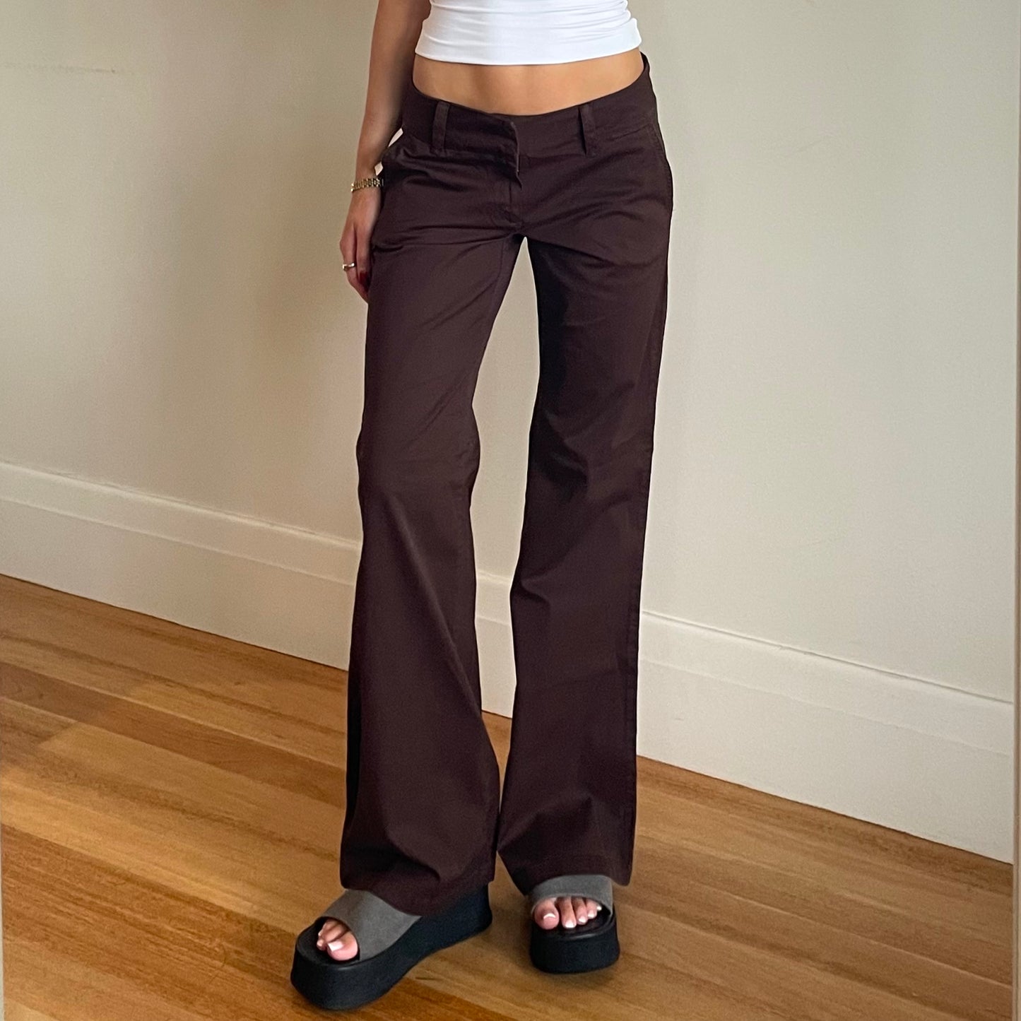 brown low rise trousers