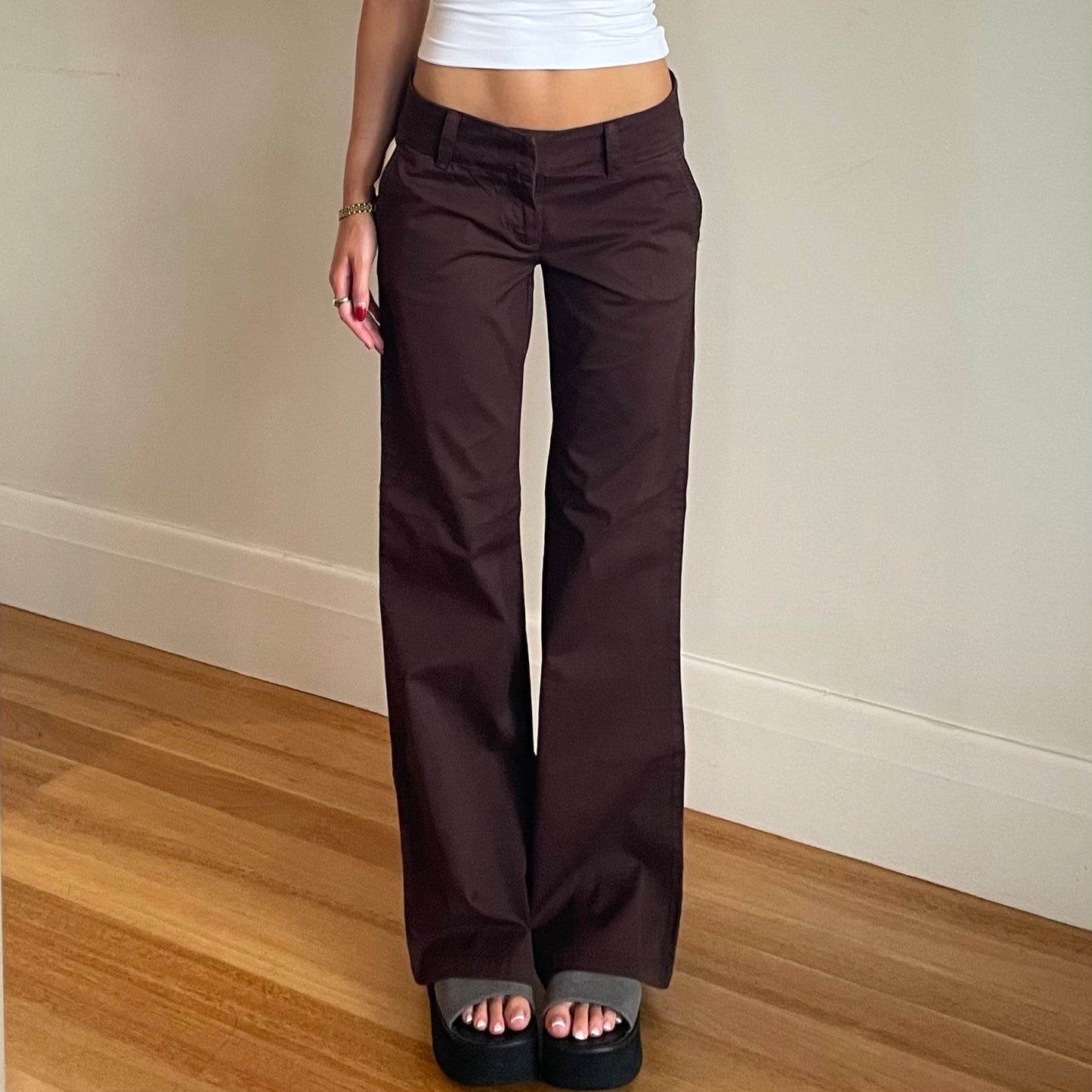 brown low rise trousers