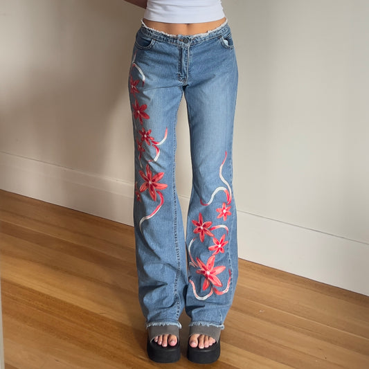 floral painted denim jeans
