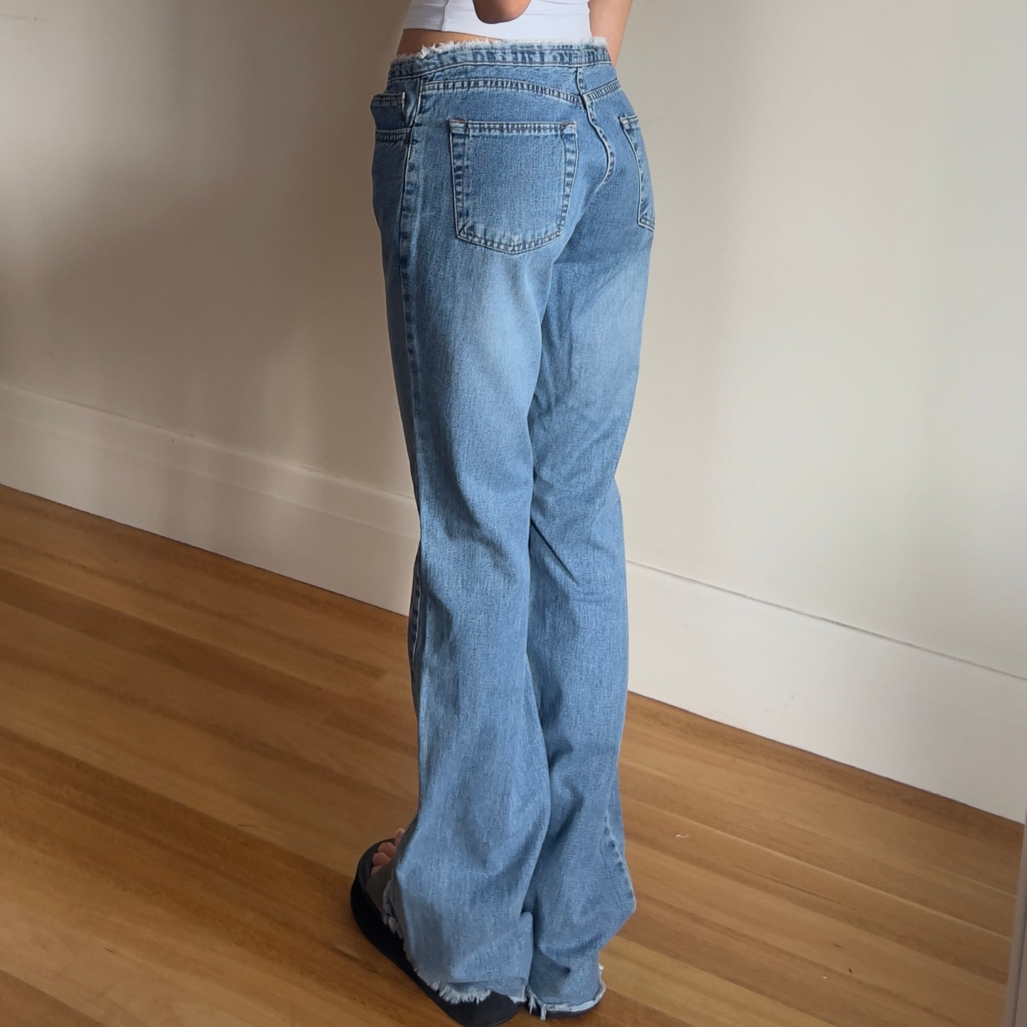 floral painted denim jeans