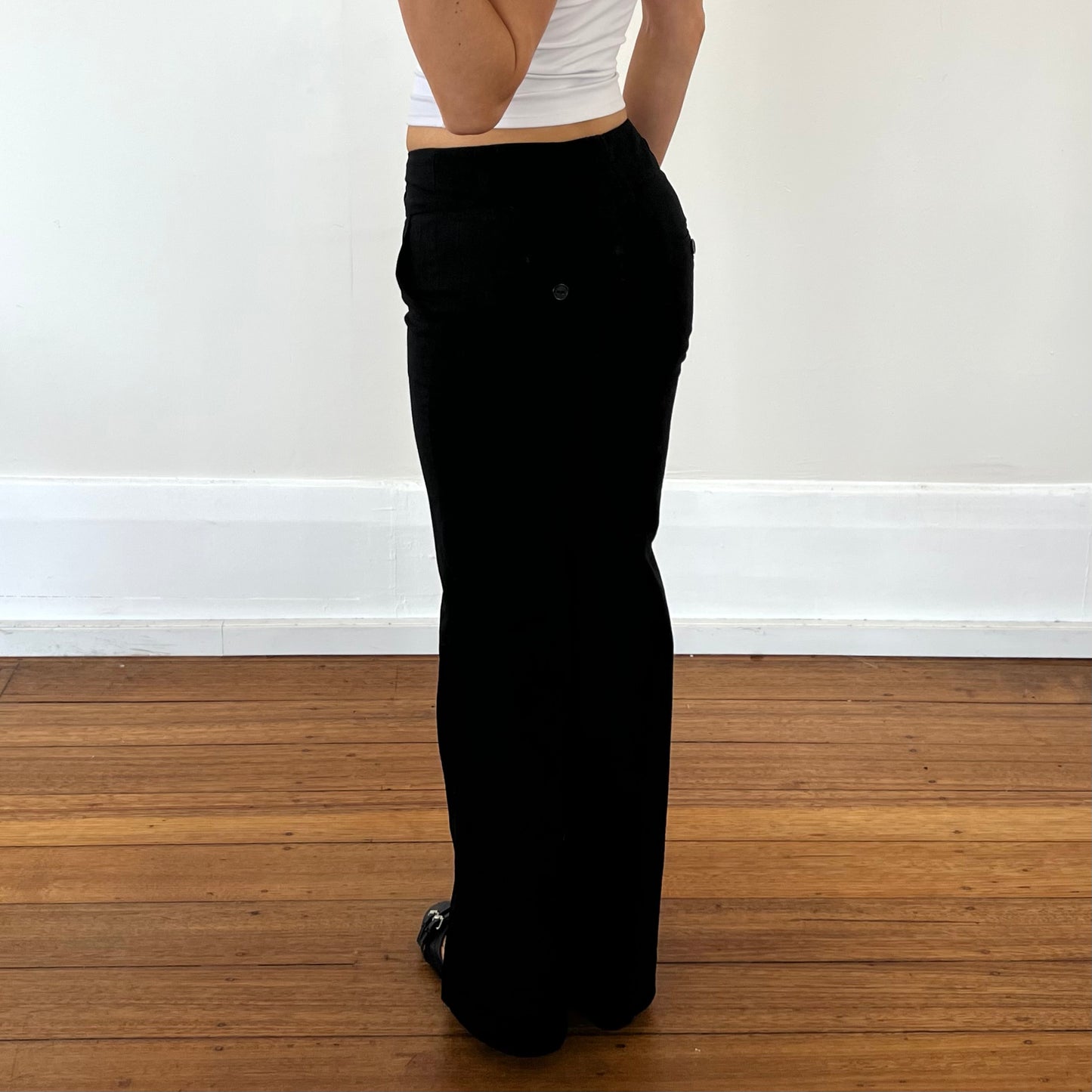 black low rise trousers