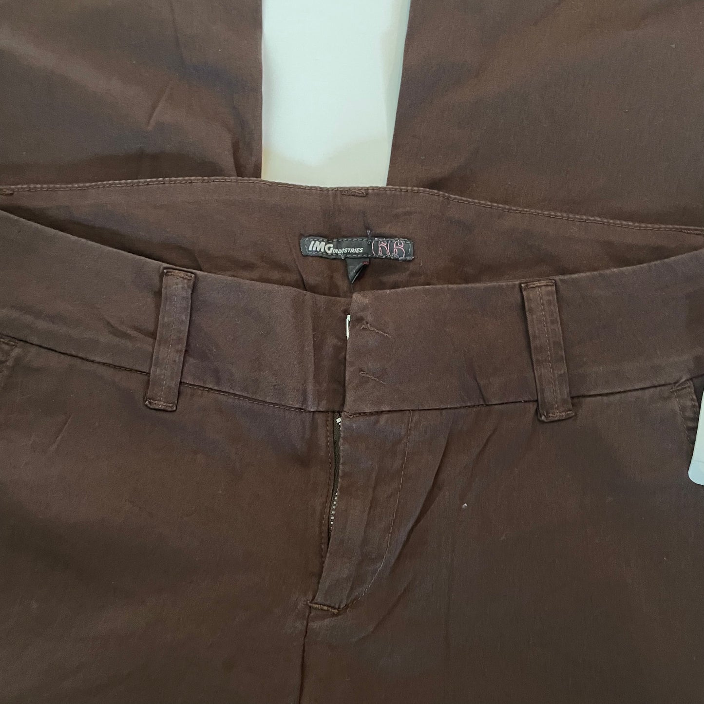 brown low rise trousers