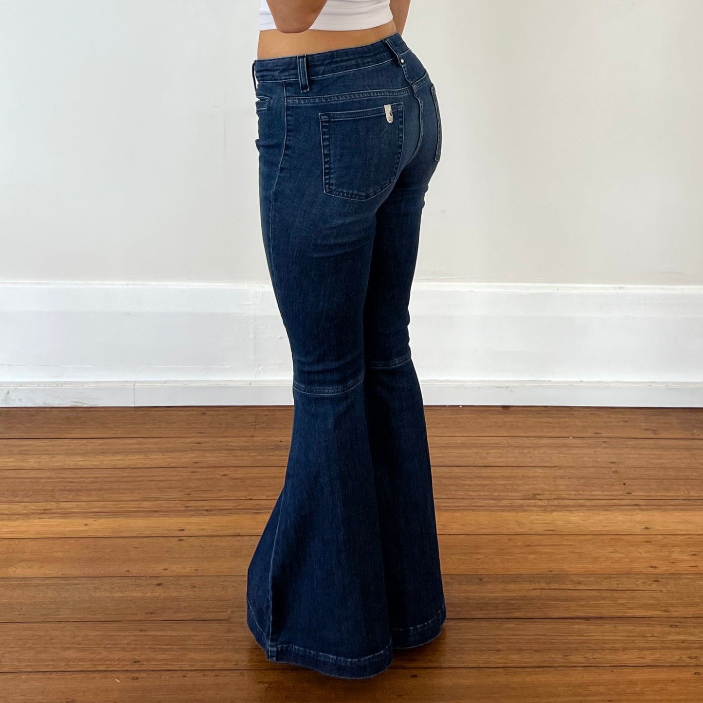 dark denim low rise flared jeans