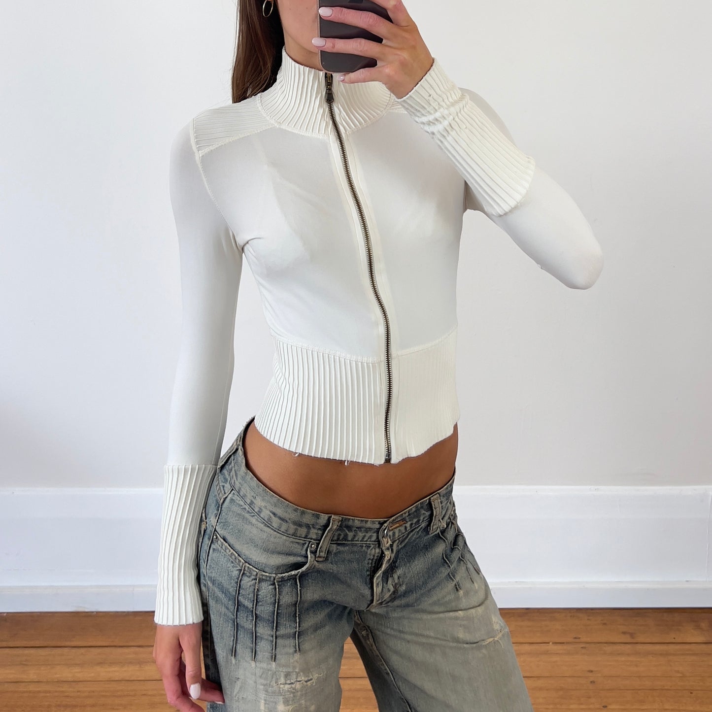 white zip up jacket