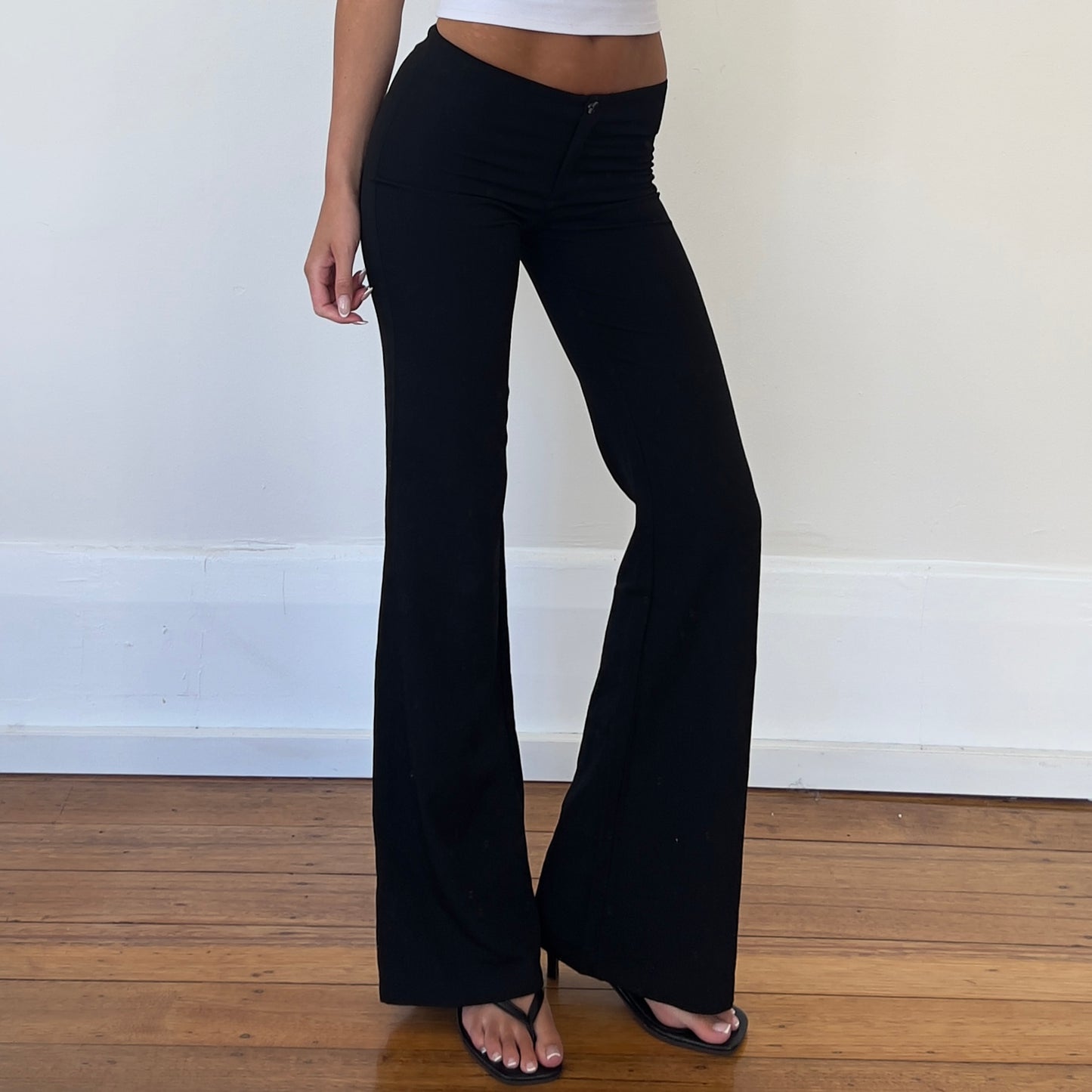 black low rise flared trousers