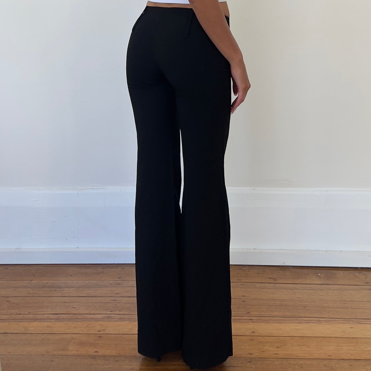 black low rise flared trousers