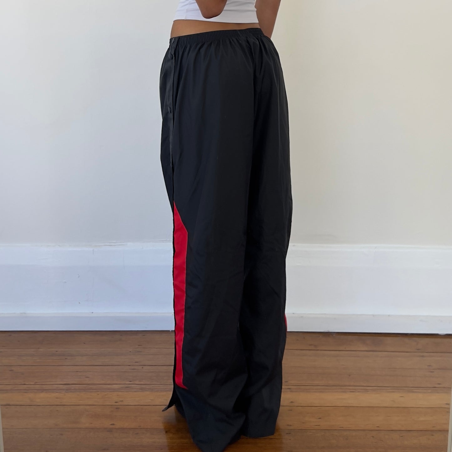 grey/red Nike track pants