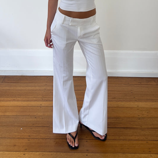 white flared trousers