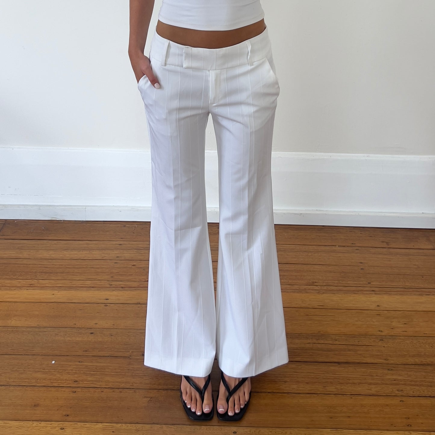 white flared trousers