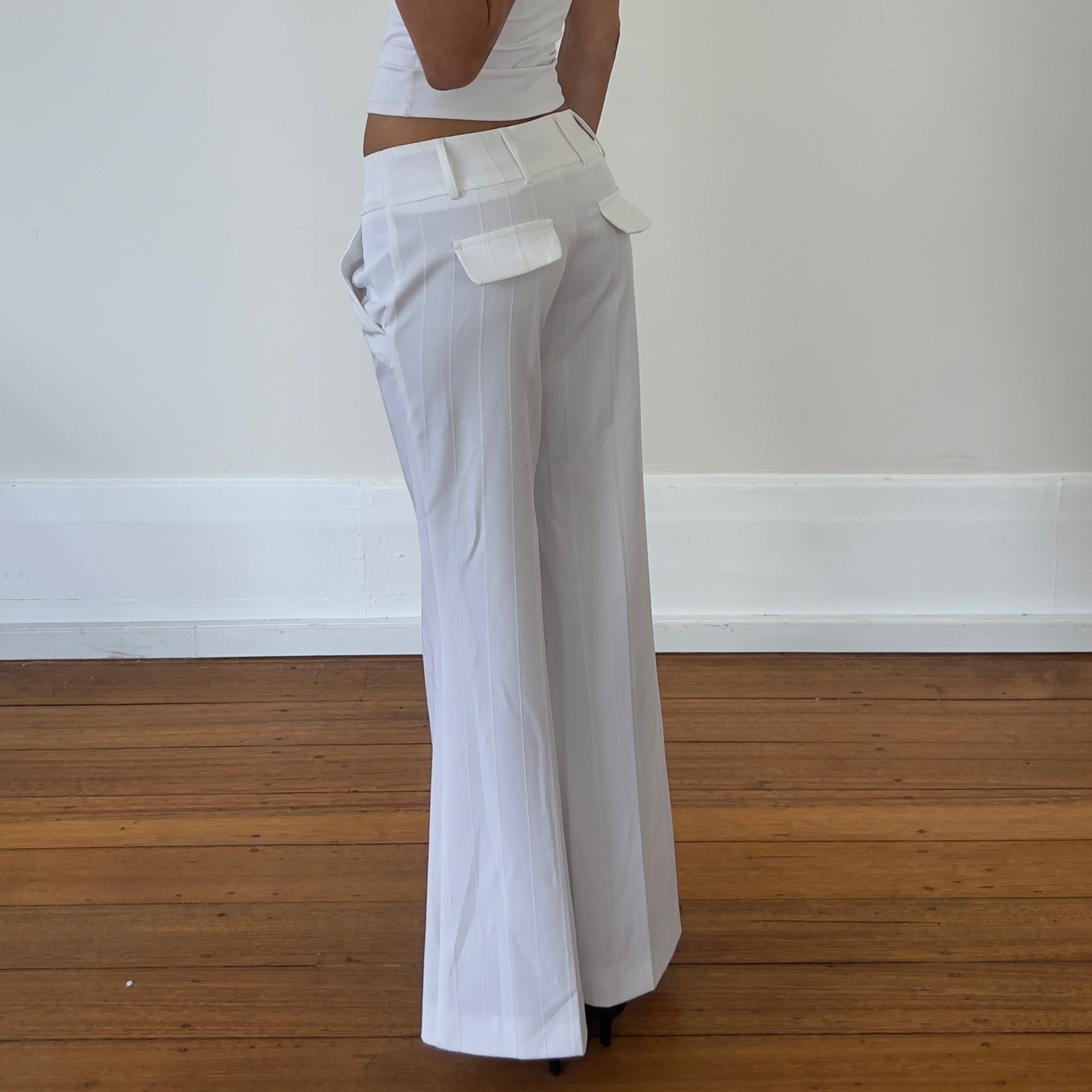 white flared trousers