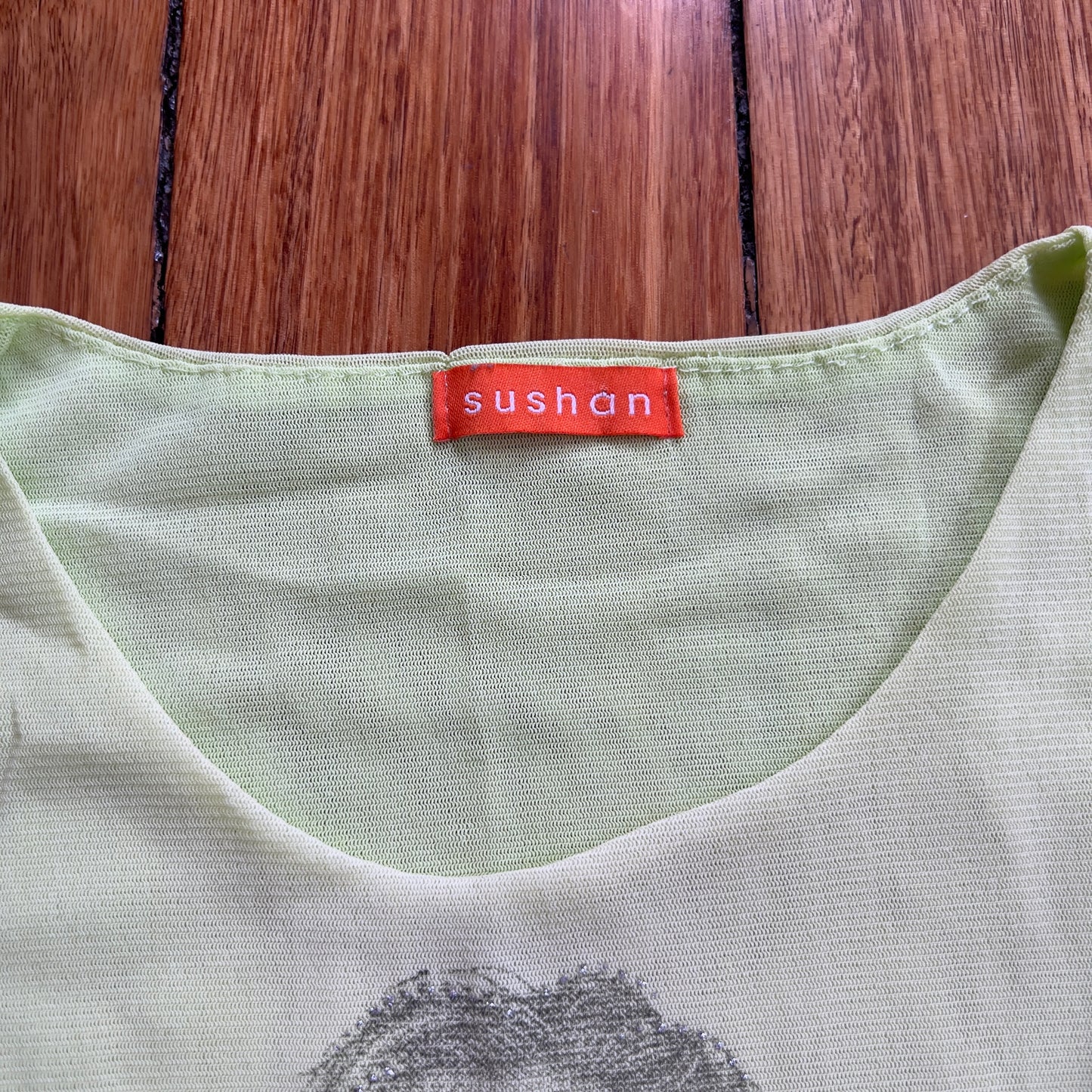 graphic green mesh tank