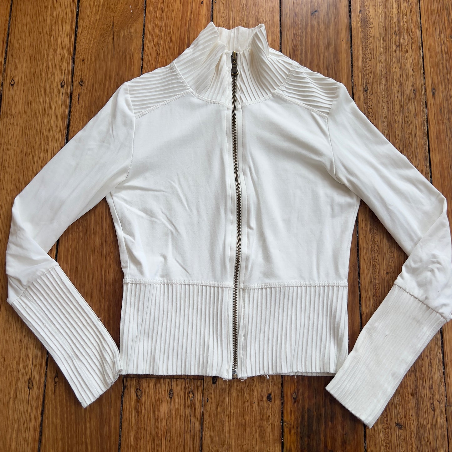 white zip up jacket