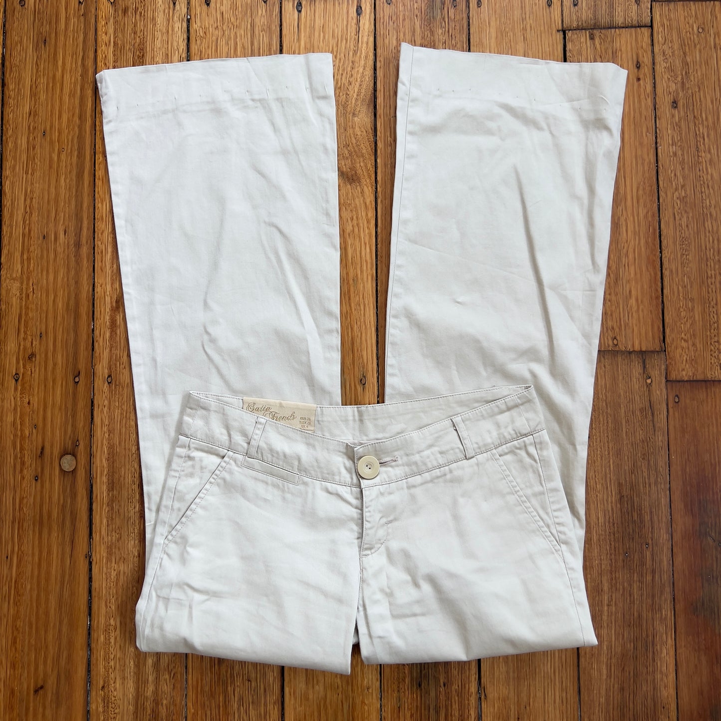 low rise flared beige trousers