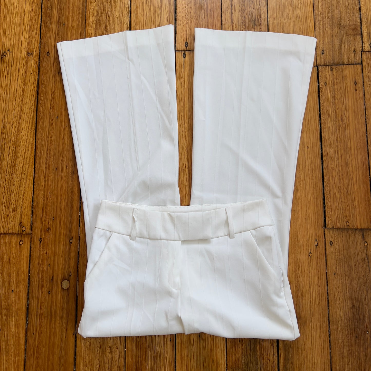 white flared trousers