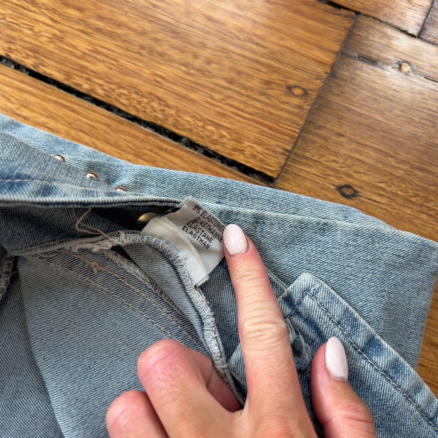 low rise flared buckle jeans