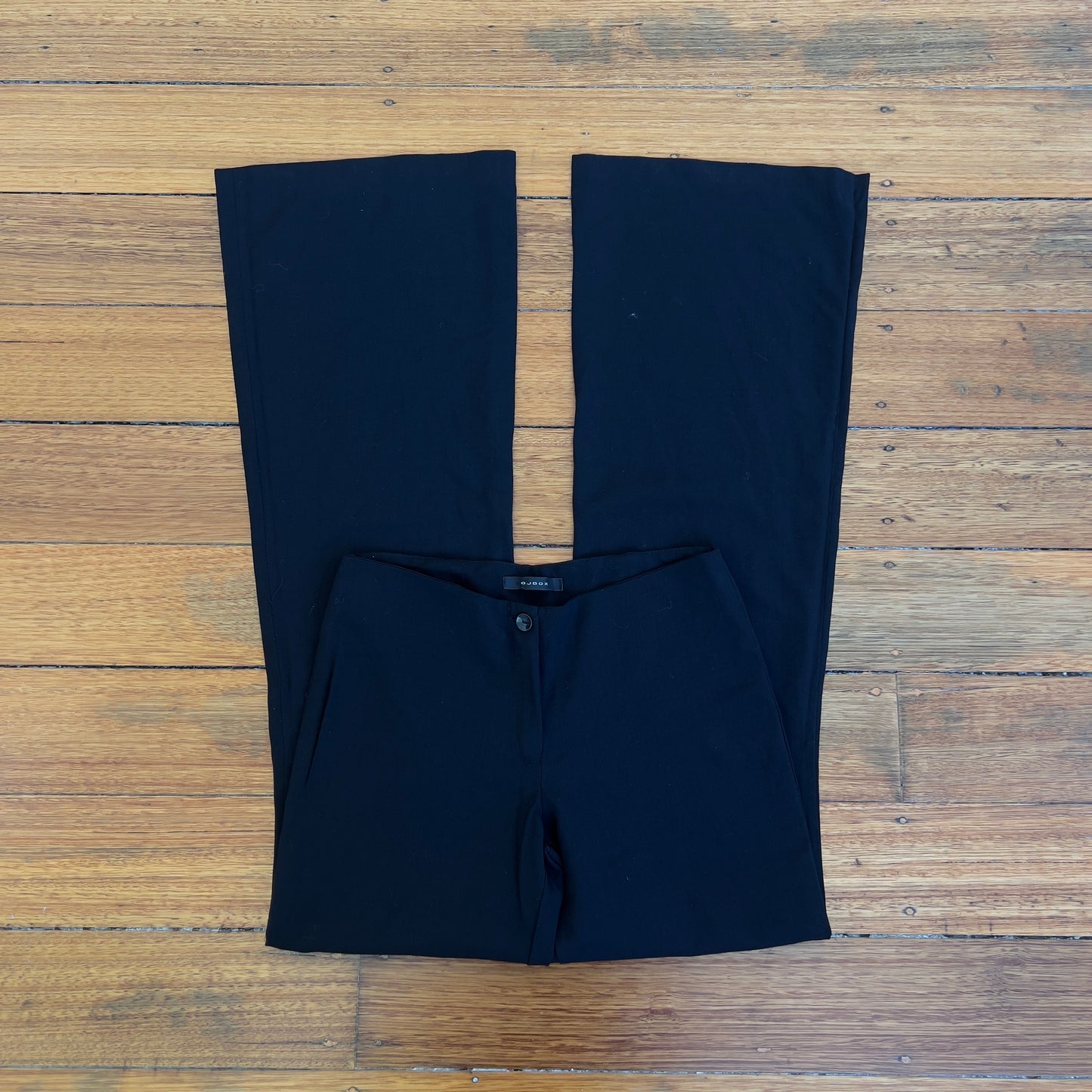 black low rise flared trousers